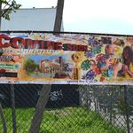 The banner hanging at the corner of Nostrand Avenue and Herkimer Street